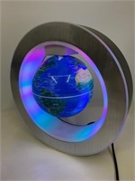 Globe lumineux en lévitation