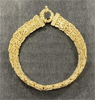 (CX) 14K Gold Turkish Made Clip Bracelet. 10.56