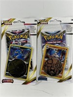 (2) Pokémon boosters with coins