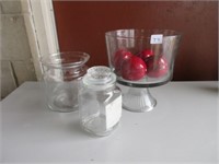 glass canister, bowls, fake fruit
