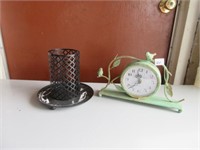 Clock and candle holder .