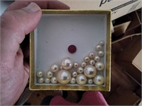 Small box of pearls from a broken necklace