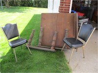 Antique table and 2 chairs .