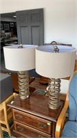 (2) gold colored spiral lamps. Untested