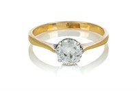 18K GOLD AND PLATINUM DIAMOND SOLITAIRE RING, 2g