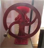 Vintage cast grinding mill. Measures 16 1/4" H.