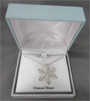 Sterling Silver snowflake necklace.