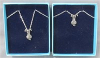 (2) Sterling Silver necklaces.