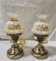 Pair of glass globe brass lamps