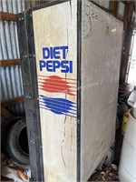 Diet Pepsi upright pop machine—does cool, changer