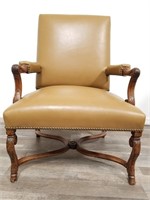 Rustic leather upholstered arm chair