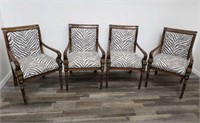 Group of 4 zebra pattern carved wood arm chairs
