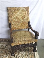 Vintage carved wood arm chair
