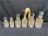 Vintage six piece glass vanity set in cabinet