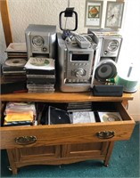B - CABINET, PORTABLE STEREO & CD'S (05)