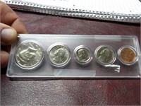 1991 COINS IN PLASTIC HOLDER IN NICE SHAPE
