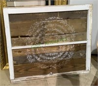 Vintage two pane window with applied country
