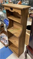 Nice little wooden step back shelving unit with