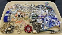 Tray lot of costume jewelry includes earrings,