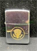 Zippo lighter with the Presidential Seal on the