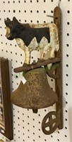 Vintage cast iron wall mount bell with dairy cow