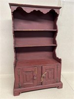 Miniature red painted cabinet