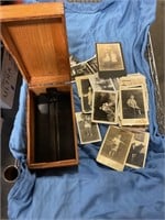 Assorted black and white pictures in box