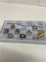Salesman sample school rings and costume jewelry