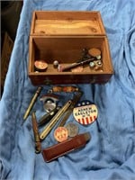 Assorted collectibles in wooden box
