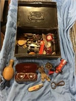 Tin box with assorted collectibles