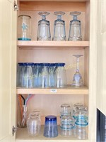Cabinet Full Of Mostly Blue Themed Glassware