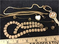 Gold plated chains, locket, key