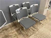 SET OF 4 CUSHIONED STACKING CHAIRS