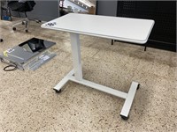 ADJUSTABLE OVERBED TABLE ON WHEELS