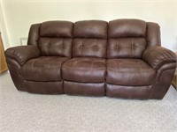 Suede couch with reclining ends