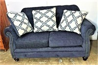 Ashley Furniture Upholstered Love Seat with Throw