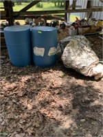 2 plastic barrels and feed tote