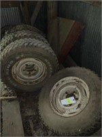 Four P225/75R15 tires and wheels