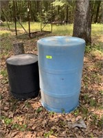Plastic barrel and 2 black tubs