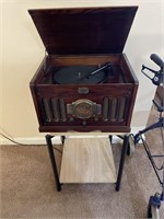 Record, radio and cassette player with stand
