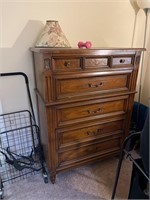 Tall wood dresser has built in dividers  includes