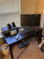 Desk with every thing on it