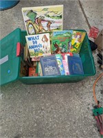 Tote of various kids books, puzzles