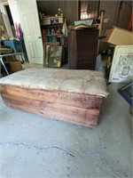 WoodenMeadville Pa crate with cloth cushoin lid