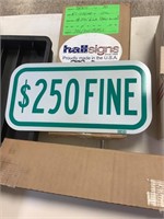 Two boxes of $250 fine reflective metal signs12 x