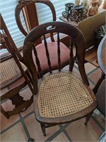 Set of four woven bottom chairs
