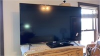 Large TCL flatscreen TV Roku