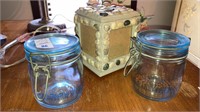 Blue glass storage jars, spinning photo display