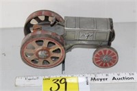 Tin wind-up tractor - has repairs, made in Germany