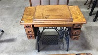 SINGER SEWING MACHINE AND CABINET